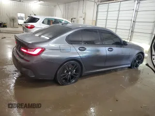 2019 BMW 3 Series 330i xDrive with VIN WBA5R7C57KAJ86027, listed as a Copart auction lot 61203435 with 41,486 mi miles and Salvage title. Bid and sale history available at DreamBid. Image 3.