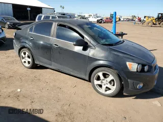 2013 Chevrolet Sonic LTZ with VIN 1G1JE5SH7D4226596, listed as a Copart auction lot 40272184 with 150,981 mi miles and Salvage title. Bid and sale history available at DreamBid. Image 4.