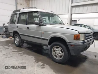 1996 Land Rover Discovery z VIN SALJY1282TA192177, wystawiony jako IAAI lot #42221390 z przebiegiem 167 727 mil mil oraz . Historia ofert i sprzedaży dostępna na DreamBid. Obrazek 1.