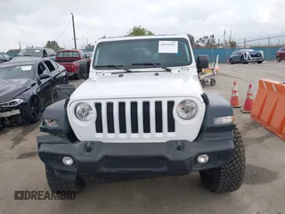 2023 Jeep Wrangler Sport S with VIN 1C4HJXDG0PW638871, listed as a IAAI auction lot 42129295 with 16,171 mi miles and . Bid and sale history available at DreamBid. Image 12.