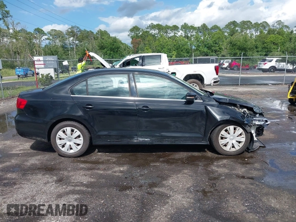 2013 Volkswagen Jetta SE z VIN 3VWDX7AJ4DM396477, wystawiony jako IAAI lot #42659959 z przebiegiem 115 833 mil mil oraz . Historia ofert i sprzedaży dostępna na DreamBid. Obrazek 13.