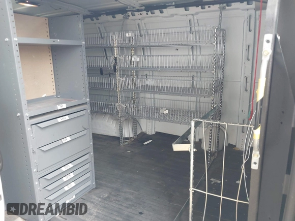 2013 Chevrolet Express Cargo with VIN 1GCSGAFX9D1179458, listed as a IAAI auction lot 42095702 with 212,186 mi miles and . Bid and sale history available at DreamBid. Image 8.