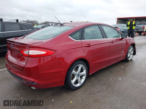 2014 Ford Fusion SE Hybrid with VIN 3FA6P0LU6ER315743, listed as a IAAI auction lot 41212111 with 83,433 mi miles. Bid and sale history available at carsss.com. Image 4.