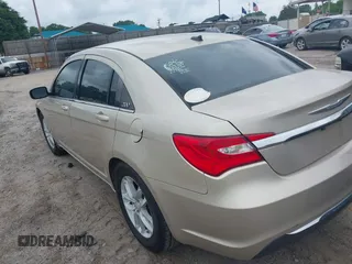 2014 Chrysler 200 Touring with VIN 1C3CCBBBXEN118019, listed as a IAAI auction lot 42154127 with 140,301 mi miles and . Bid and sale history available at carsss.com. Image 3.