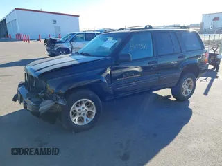 1996 Jeep Grand Cherokee Limited with VIN 1J4GZ78S5TC196338, listed as a IAAI auction lot 41199541 with Not Provided miles. Bid and sale history available at carsss.com. Image 2.