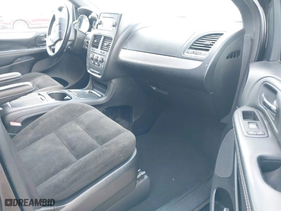 2015 Dodge Grand Caravan SXT with VIN 2C4RDGCG1FR748509, listed as a IAAI auction lot 41997581 with 93,329 mi miles. Bid and sale history available at carsss.com. Image 5.