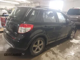2009 Suzuki SX4 Man AWD with VIN JS2YB413096204911, listed as a IAAI auction lot 41572173 with 84,763 mi miles. Bid and sale history available at carsss.com. Image 4.