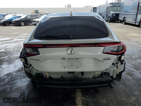 2024 Honda Civic Sport Touring z VIN 19XFL1G85RE012975, wystawiony jako Copart lot #50999015 z przebiegiem 13 552 mil mil oraz Szkoda całkowita • Salvage title. Historia ofert i sprzedaży dostępna na DreamBid. Obrazek 6.