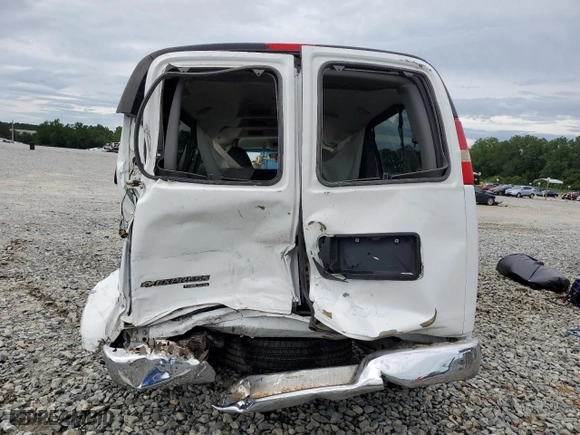 2012 Chevrolet Express Passenger 1LT with VIN 1GAZG1FG5C1183156, listed as a Copart auction lot 65655454 with 130,915 mi miles and Salvage Title. Bid and sale history available at carsss.com. Image 6.