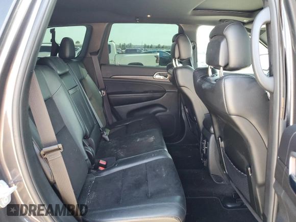 2017 Jeep Grand Cherokee Laredo with VIN 1C4RJEAG1HC854339, listed as a Copart auction lot 50432985 with 113,079 mi miles and Salvage Title. Bid and sale history available at carsss.com. Image 10.