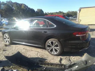 2021 Volkswagen Passat 2.0T SE with VIN 1VWSA7A34MC014993, listed as a IAAI auction lot 40556424 with 64,508 mi miles. Bid and sale history available at carsss.com. Image 15.