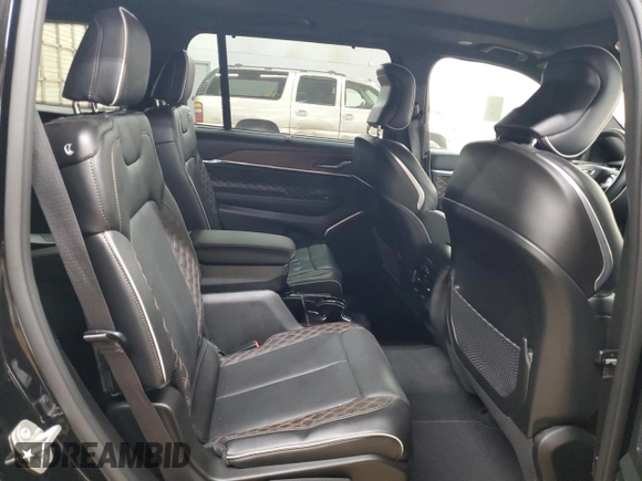 2023 Jeep Grand Cherokee Summit Reserve with VIN 1C4RJKEG3P8862582, listed as a Copart auction lot 54504345 with 9,763 mi miles and Salvage title. Bid and sale history available at DreamBid. Image 11.