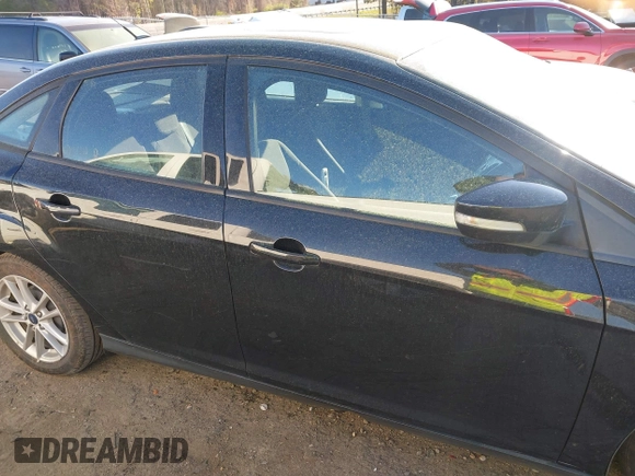 2015 Ford Focus SE with VIN 1FADP3F29FL210973, listed as a IAAI auction lot 41874367 with 128,705 mi miles. Bid and sale history available at carsss.com. Image 13.