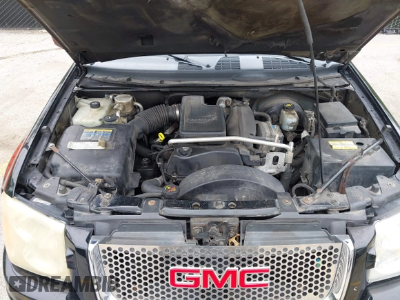 2005 GMC Envoy XL SLE with VIN 1GKET16S156114805, listed as a IAAI auction lot 42163519 with 168,584 mi miles. Bid and sale history available at carsss.com. Image 10.