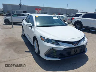 2023 Toyota Camry LE z VIN 4T1C11AKXPU804367, wystawiony jako IAAI lot #42019545 z przebiegiem 23 737 mil mil oraz . Historia ofert i sprzedaży dostępna na DreamBid. Obrazek 1.
