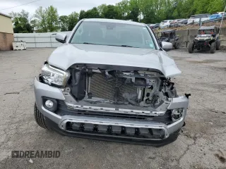 2021 Toyota Tacoma SR5 z VIN 3TYAZ5CN5MT004373, wystawiony jako Copart lot #58526145 z przebiegiem Nie podano mil oraz Szkoda całkowita • Salvage title. Historia ofert i sprzedaży dostępna na DreamBid. Obrazek 5.