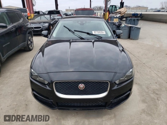 2019 Jaguar XE 25t with VIN SAJAS4FX1KCP49077, listed as a Copart auction lot 87104284 with 124,857 mi miles and Clean Title. Bid and sale history available at carsss.com. Image 5.