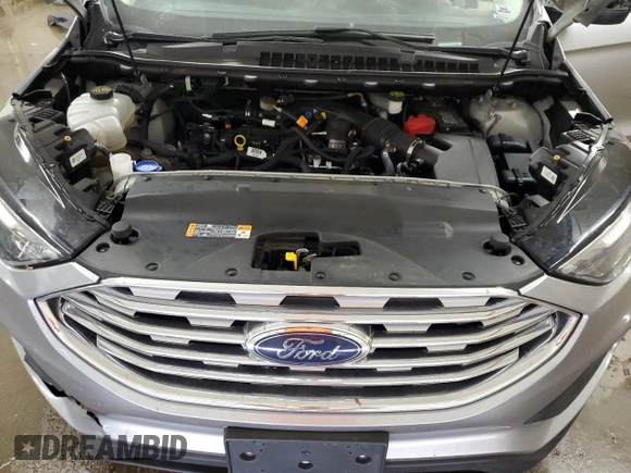 2020 Ford Edge SE z VIN 2FMPK4G9XLBA07766, wystawiony jako Copart lot #56852365 z przebiegiem 151 664 mil mil oraz Szkoda całkowita • Salvage title. Historia ofert i sprzedaży dostępna na DreamBid. Obrazek 12.