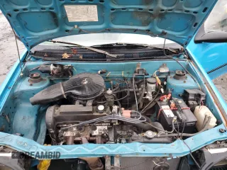 1992 Geo Metro z VIN 2C1MR2467N6724779, wystawiony jako Copart lot #81355814 z przebiegiem 85 587 mil mil oraz Szkody całkowita. Historia ofert i sprzedaży dostępna na DreamBid. Obrazek 11.