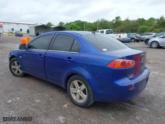 2008 Mitsubishi Lancer DE with VIN JA3AU26U68U037460, listed as a IAAI auction lot 41979573 with 220,238 mi miles. Bid and sale history available at carsss.com. Image 3.