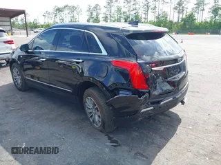 2017 Cadillac XT5 Luxury FWD z VIN 1GYKNBRS0HZ116875, wystawiony jako IAAI lot #42155840 z przebiegiem 47 625 mil mil oraz . Historia ofert i sprzedaży dostępna na DreamBid. Obrazek 3.