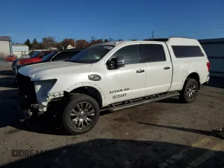 2017 Nissan Titan XD SV with VIN 1N6BA1F4XHN562974, listed as a Copart auction lot 79452174 with 86,414 mi miles and Salvage Title. Bid and sale history available at carsss.com. Image 1.