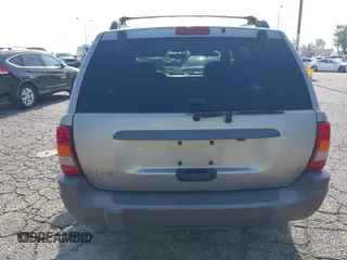 2004 Jeep Grand Cherokee Laredo with VIN 1J4GX48N24C334983, listed as a IAAI auction lot 42522088 with 169,793 mi miles and . Bid and sale history available at DreamBid. Image 16.