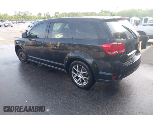 2013 Dodge Journey R/T with VIN 3C4PDCEG7DT682670, listed as a IAAI auction lot 42057985 with 221,755 mi miles and . Bid and sale history available at DreamBid. Image 3.