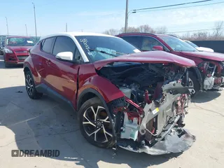 2018 Toyota C-HR XLE with VIN NMTKHMBX2JR012246, listed as a IAAI auction lot 41735772 with 124,467 mi miles. Bid and sale history available at carsss.com. Image 1.