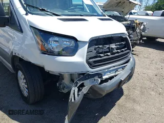 2018 Ford Transit with VIN 1FTYR2CM9JKA52056, listed as a IAAI auction lot 42542981 with 151,835 mi miles and . Bid and sale history available at DreamBid. Image 6.
