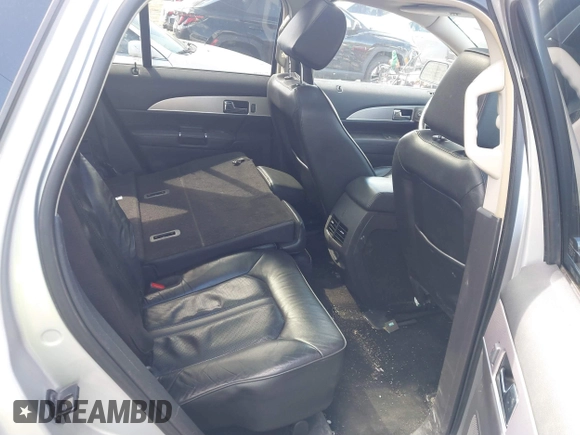 2014 Lincoln MKX with VIN 2LMDJ8JK4EBL10705, listed as a IAAI auction lot 41870228 with 166,527 mi miles and . Bid and sale history available at DreamBid. Image 8.