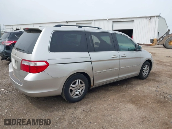 2007 Honda Odyssey EX-L z VIN 5FNRL38677B451060, wystawiony jako IAAI lot #42161554 z przebiegiem 190 147 mil mil oraz . Historia ofert i sprzedaży dostępna na DreamBid. Obrazek 4.