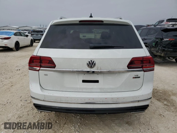 2018 Volkswagen Atlas SE z VIN 1V2PR2CA0JC558787, wystawiony jako Copart lot #50322575 z przebiegiem 104 103 mil mil oraz Szkoda całkowita • Salvage title. Historia ofert i sprzedaży dostępna na DreamBid. Obrazek 6.
