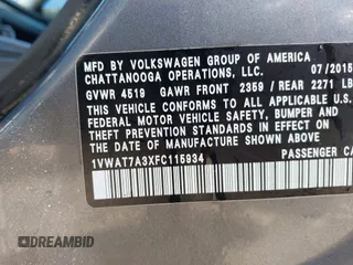 2015 Volkswagen Passat 1.8T Wolfsburg Ed with VIN 1VWAT7A3XFC115934, listed as a IAAI auction lot 41948035 with 243,143 mi miles. Bid and sale history available at carsss.com. Image 9.