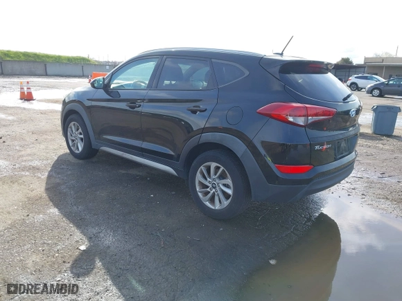 2017 Hyundai Tucson SE Plus with VIN KM8J33A41HU327540, listed as a IAAI auction lot 41820850 with 129,227 mi miles. Bid and sale history available at carsss.com. Image 3.