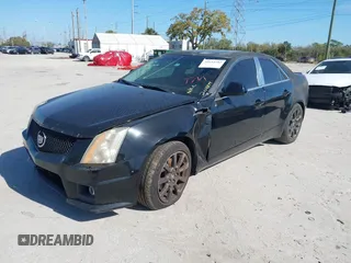 2008 Cadillac CTS RWD with VIN 1G6DP57V880204877, listed as a IAAI auction lot 41654282 with 165,948 mi miles and . Bid and sale history available at DreamBid. Image 2.