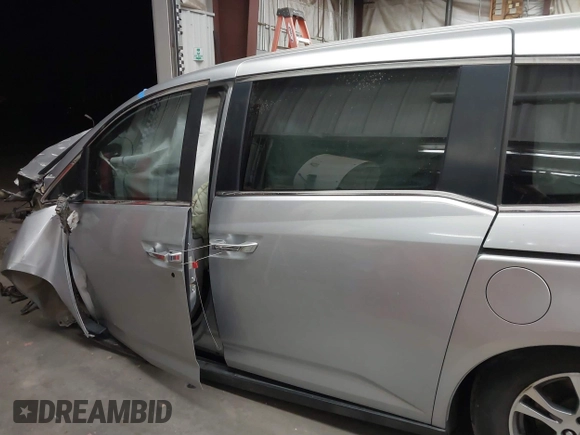 2011 Honda Odyssey EX-L with VIN 5FNRL5H62BB083682, listed as a IAAI auction lot 41425267 with 169,166 mi miles and . Bid and sale history available at carsss.com. Image 13.
