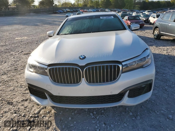 2019 BMW 7 Series 740i с VIN WBA7E2C51KB218262, выставлен на аукционе Copart как лот 52755095 с пробегом 55 082 миль миль и Списание • Salvage title. История ставок и продаж доступна на DreamBid. Изображение 5.