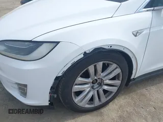 2016 Tesla Model X 70D with VIN 5YJXCBE24GF002020, listed as a IAAI auction lot 41799528 with 149,556 mi miles. Bid and sale history available at carsss.com. Image 6.