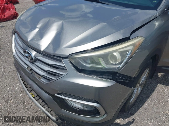 2018 Hyundai Santa Fe 2.0T с VIN 5NMZU4LAXJH057363, выставлен на аукционе IAAI как лот 42265981 с пробегом 118 536 миль миль и . История ставок и продаж доступна на DreamBid. Изображение 6.