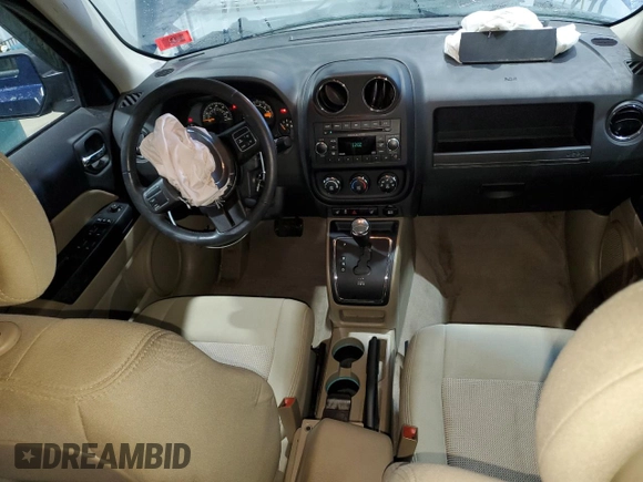 2014 Jeep Patriot Latitude with VIN 1C4NJRFB0ED852882, listed as a Copart auction lot 49674915 with 130,367 mi miles and Salvage title. Bid and sale history available at DreamBid. Image 8.