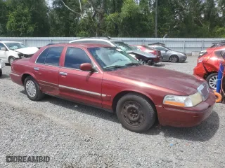 2003 Mercury Grand Marquis GS Convenience with VIN 2MEFM74W73X704870, listed as a Copart auction lot 71243934 with 120,807 mi miles and Salvage Title. Bid and sale history available at carsss.com. Image 4.