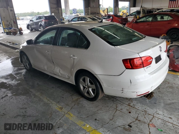 2013 Volkswagen Jetta TDI w/Premium with VIN 3VWLL7AJ0DM351270, listed as a Copart auction lot 71204324 with 91,075 mi miles and Salvage title. Bid and sale history available at DreamBid. Image 2.