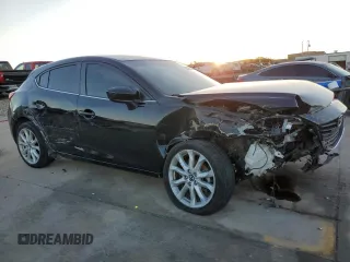 2014 Mazda 3 S Touring with VIN JM1BM1L34E1103688, listed as a Copart auction lot 79413874 with 48,667 mi miles and Salvage Title. Bid and sale history available at DreamBid. Image 4.
