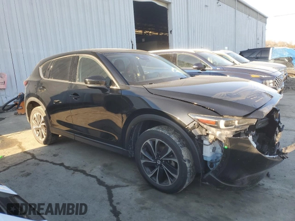 2022 Mazda CX-5 2.5 S Premium Package with VIN JM3KFBDM8N1544836, listed as a Copart auction lot 45573495 with 75,312 mi miles and Salvage Title. Bid and sale history available at carsss.com. Image 4.