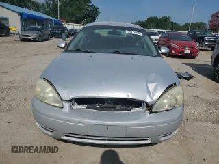 2004 Ford Taurus SE with VIN 1FAFP53U04G133586, listed as a Copart auction lot 59972925 with 228,938 mi miles and Salvage title. Bid and sale history available at DreamBid. Image 5.