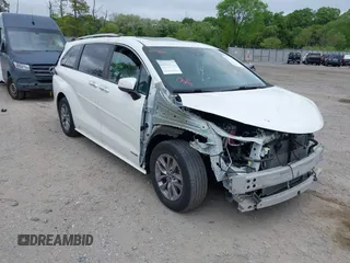 2021 Toyota Sienna XLE z VIN 5TDYSKFC6MS002087, wystawiony jako IAAI lot #42182937 z przebiegiem 63 192 mil mil oraz . Historia ofert i sprzedaży dostępna na DreamBid. Obrazek 1.
