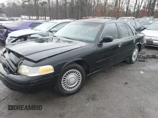 1999 Ford Crown Victoria Police with VIN 2FAFP71W3XX130521, listed as a IAAI auction lot 41384939 with 257,504 mi miles. Bid and sale history available at carsss.com. Image 2.