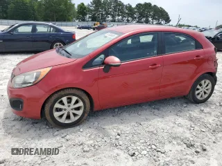 2013 Kia Rio SX with VIN KNADN5A35D6310136, listed as a Copart auction lot 57028085 with 136,764 mi miles and Salvage title. Bid and sale history available at DreamBid. Image 1.