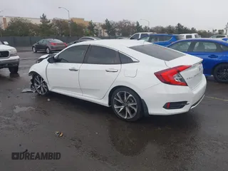 2020 Honda Civic Sedan Touring with VIN 19XFC1F91LE210390, listed as a IAAI auction lot 41766652 with 67,269 mi miles. Bid and sale history available at carsss.com. Image 3.